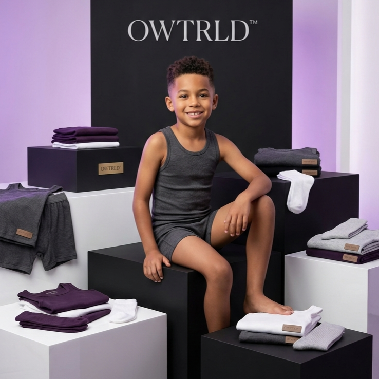 A soft and clean display of OWTRLD premium kid’s innerwear, highlighting breathable fabrics and comfortable, gentle-fit designs in a minimalist setting
