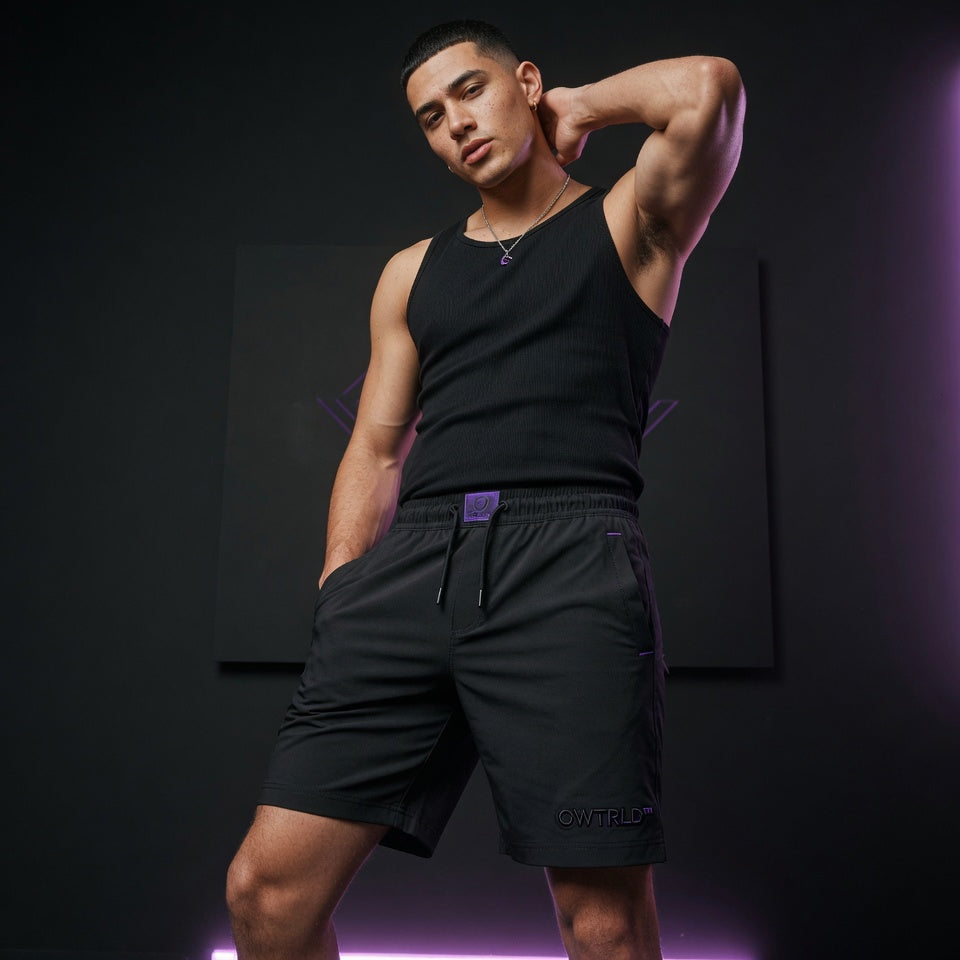 A diverse selection of OWTRLD premium men’s shorts, showcasing various styles from casual to activewear in high-quality fashion photography